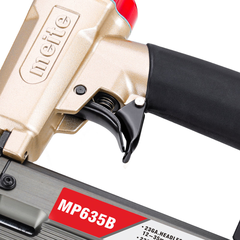 Close-up of the safety trigger section of the meite USA MP635B 22Ga pneumatic pin nailer in white background.
