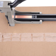 Meite USA HB3518 manual boxing stapler in use on a cardboard box