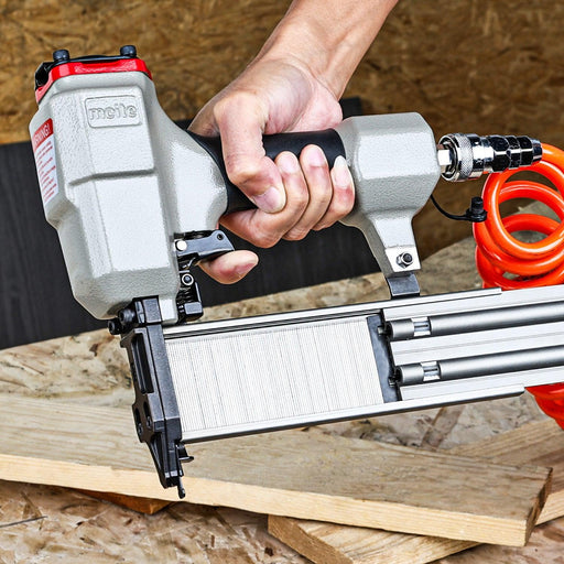 meite USA 18 gauge galvanized brad nails loaded into a pneumatic brad nailer for woodworking projects