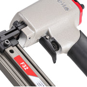 Close-up of the trigger and vibration-reducing rubber grip on the meite USA F32 18 gauge pneumatic brad nailer