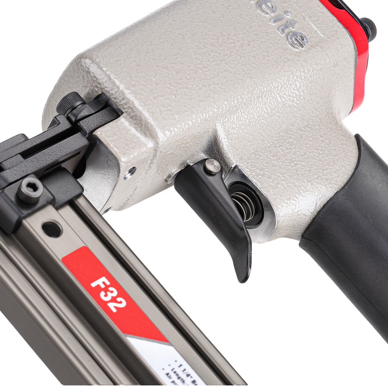 Close-up of the trigger and vibration-reducing rubber grip on the meite USA F32 18 gauge pneumatic brad nailer