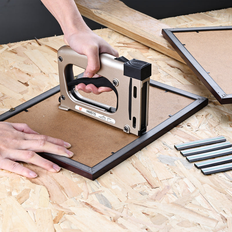 meite USA flexible picture frame points installed with a manual point driver to secure picture frame backing