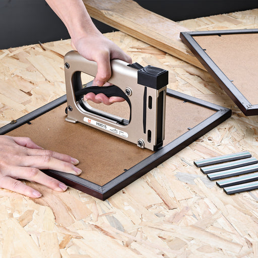 meite USA flexible picture frame points installed with a manual point driver to secure picture frame backing
