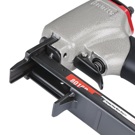 Close-up view of meite USA 8016B 21 gauge pneumatic upholstery stapler showing opening magazine