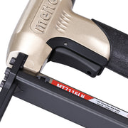 Close-up of the trigger section of the meite USA MT7116LN 22Ga pneumatic upholstery stapler.