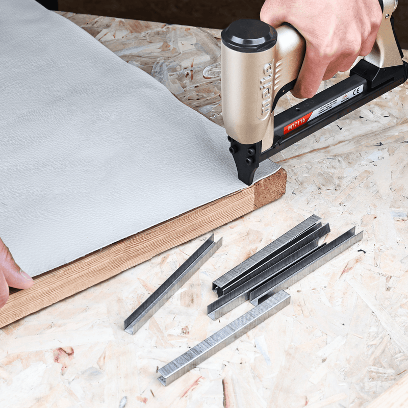 meite USA 22Ga 3/8" Crown 304 stainless steel upholstery staples fastening the canvas with stapler