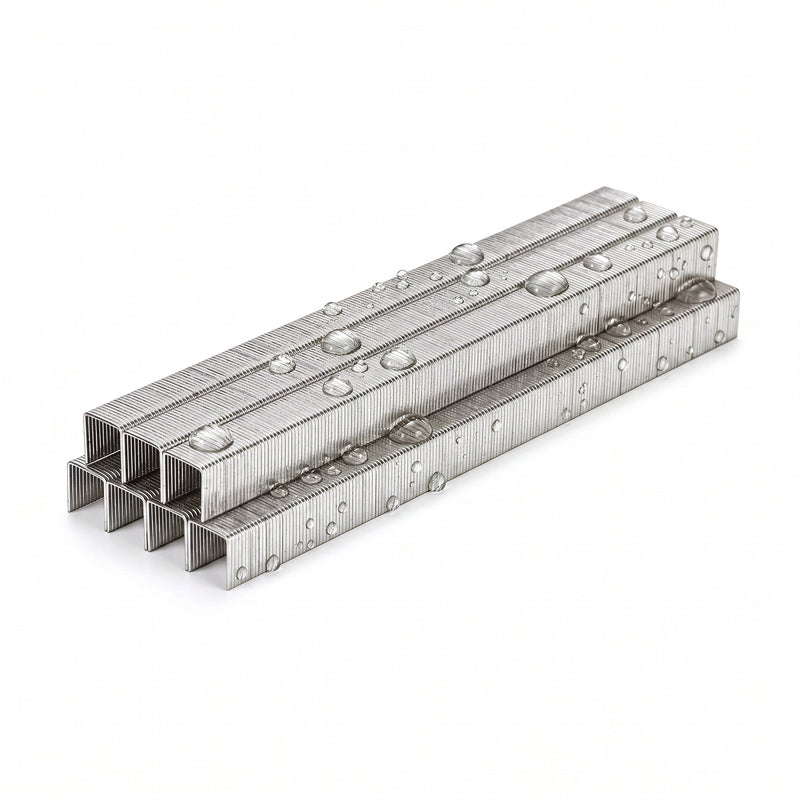 A small pile of meite USA 22 gauge 3/8" crown 304 stainless steel upholstery staples, shows water-proof feature