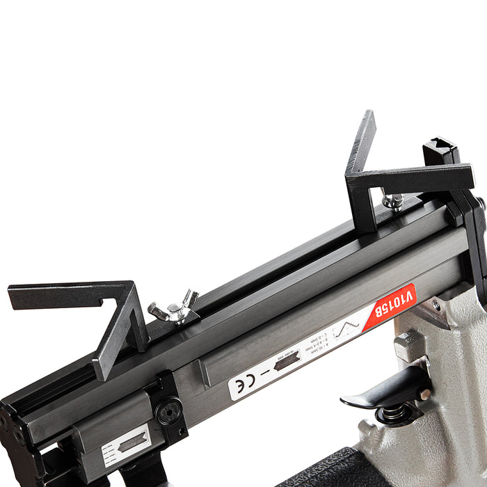 Close-up view of the Meite USA V1015B picture frame nailer, showing the adjustable positioning guides and magazine structure