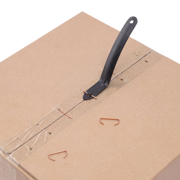 Meite USA carton stapler built-in staple remover lifting staples from a cardboard box